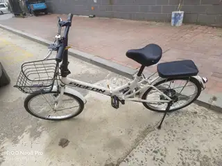 出个变速折叠自行车，有使用痕迹，带前筐和后座，刹车变速都正常，大人骑没问题，长兴岛三堂自提
