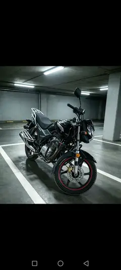出一台闲置的手续齐全本田150摩托车